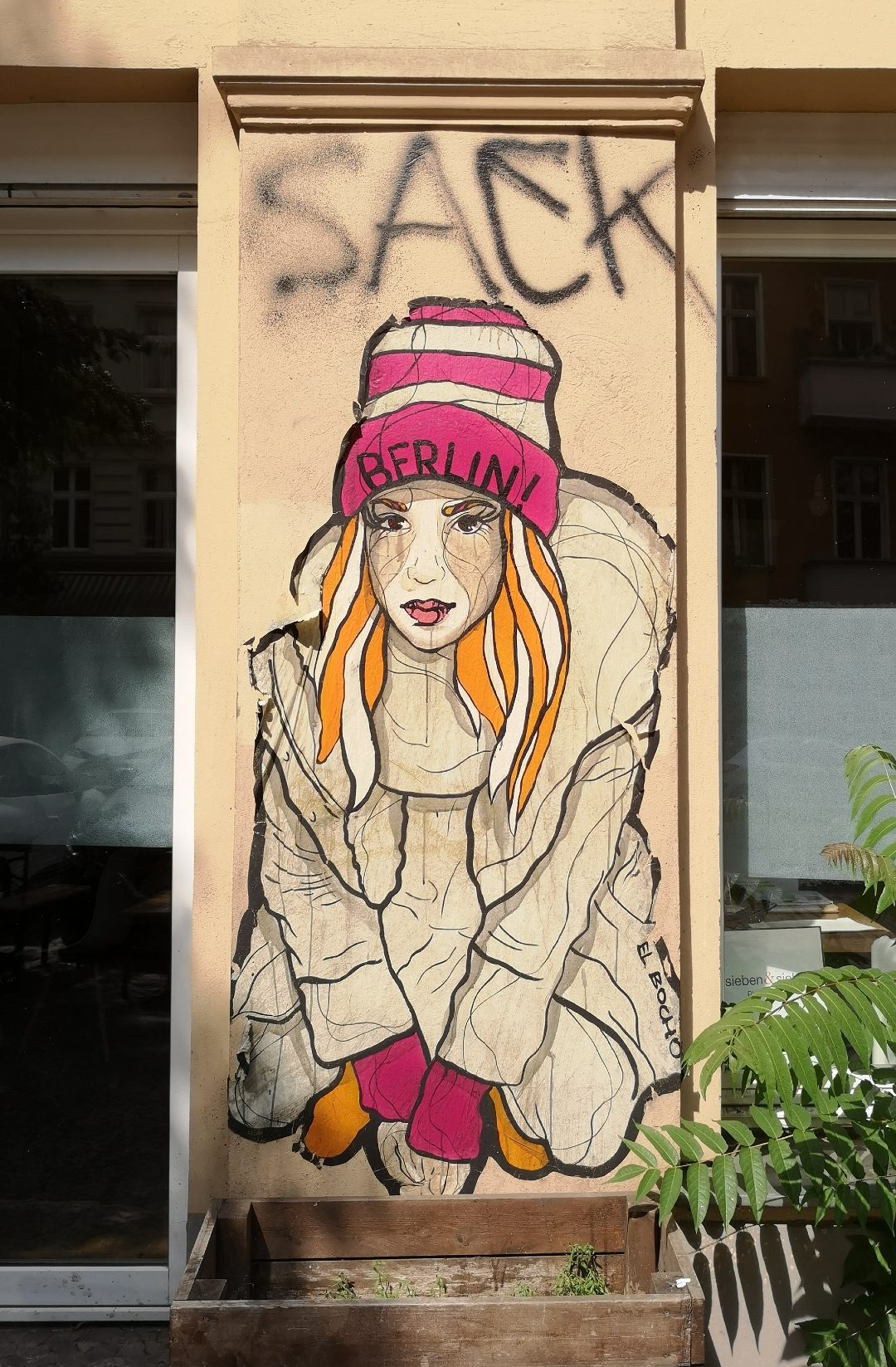 Frauenporträt Mütze Berlin Streetart